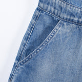 Chaleco de mezclilla con cinturón elástico y pantalones cortos de una pieza