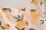 Robe mi-longue fendue à fleurs citron à lacets et bustier tubulaire