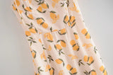 Robe mi-longue fendue à fleurs citron à lacets et bustier tubulaire