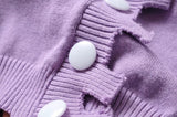 Cárdigan tipo suéter de punto irregular con botonadura sencilla