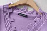 Cardigan en tricot irrégulier à boutonnage simple