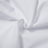 Blusa corta irregular de algodón de manga larga con botonadura sencilla