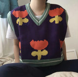 Suéter de chaleco corto de punto morado floral
