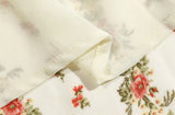 Robe mi-longue à imprimé floral et fente dans le dos