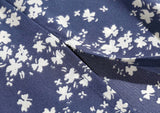 Robe mi-longue à imprimé floral et col carré vintage dos nu