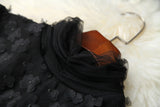 Conjunto de dos piezas de faldas con reborde de empalme de flores negras elegantes