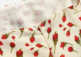 Robe mi-longue dos nu à bretelles imprimées florales