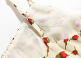 Robe mi-longue dos nu à bretelles imprimées florales