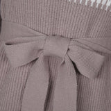 Mini-robe en tricot à manches lanterne et col montant