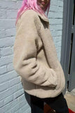 Prendas de abrigo de lana de cordero con cremallera y cuello medio alto