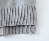 Suéteres de punto de empalme con dobladillo irregular con cuello en V