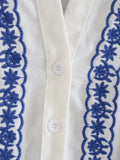 Camisas de botonadura sencilla con bordado floral Cárdigans
